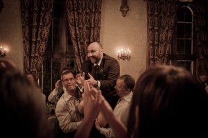 groom lifted at wedding reception