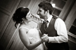 bride and groom dance in black and white