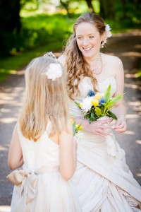 bride and flowergirl outside in woods
