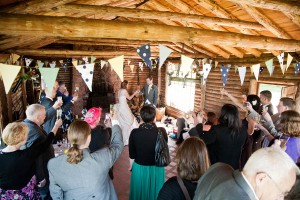 toast raised to bride ad groom at wedding at Ravensheugh log cabin