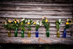 wedding flowers in recycled bottles