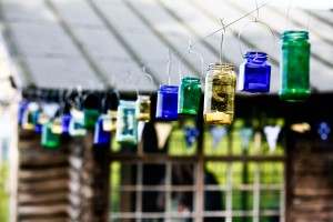 tea light in hanging jam jars at wedding