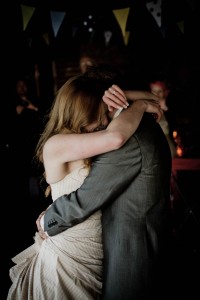 bride and groom first dance at log cabin wedding