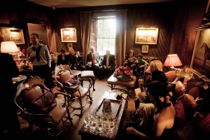 guests relax after wedding cermony at prestonfield house in edinburgh