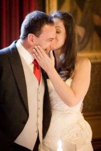 bride kisses groom at wedding at drummuir castle