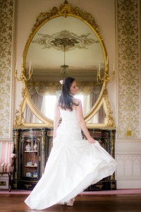 bride with mirror at wedding at drummuir castle