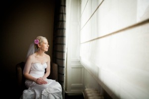 bride looks out window
