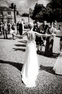 bride with arms held wide at Mar Hall
