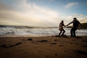 engagement photography st andrews on the beach big waves