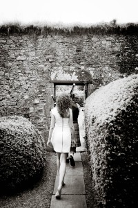 bride and groom in walled garden at traquair house